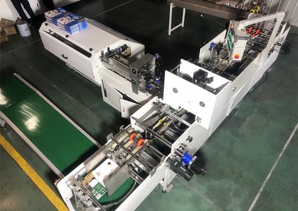 河南新印智能自動(dòng)穿提手機(jī)受到廣泛歡迎